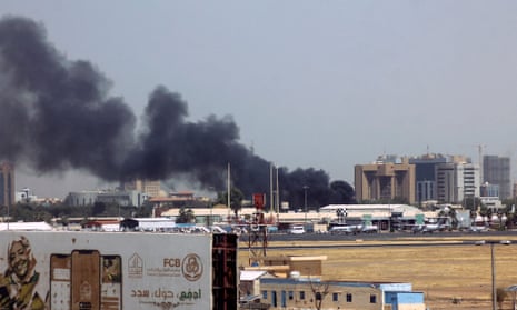 Smoke above buildings in the vicinity of the Khartoum airport.