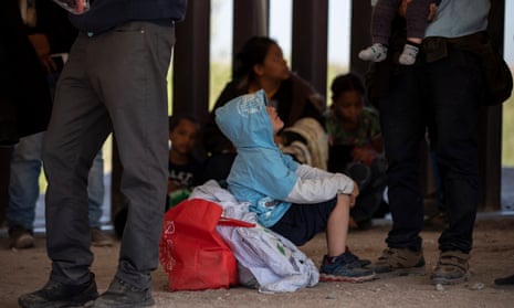 A child waits to be seen by US border patrol officers in Yuma, Arizona.