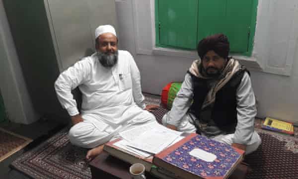 Shaair Ullah Khan Wajeehi, joint secretary of the Jame-Ul-Uloom Furqania madrasa, with Mohammed Rahman Khan, the school’s principal