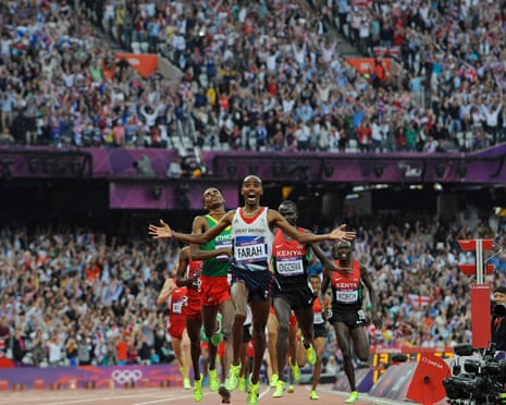 Mo Farah reacts as he crosses the finishing line to win the men’s 5,000m at the London 2012 Olympics