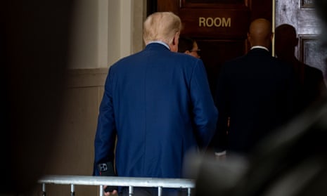 Donald Trump enters the courtroom as he continues his civic fraud trial.