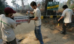 Greenpeace activists block a 135km illegal road, in the National Forest of Altamira, Brazil. The road cuts directly through the National Forest and is used for illegal logging operations and deforestation inside the protected area.