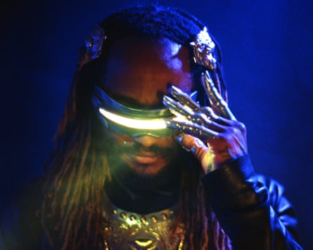 Thundercat wearing a futuristic band over his eyes.