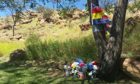 A memorial for a child who died after allegedly sniffing solvents on Billy Goat Hill in Alice Springs. The gathering spot is just metres away from a youth service that closed recently due to funding cuts.