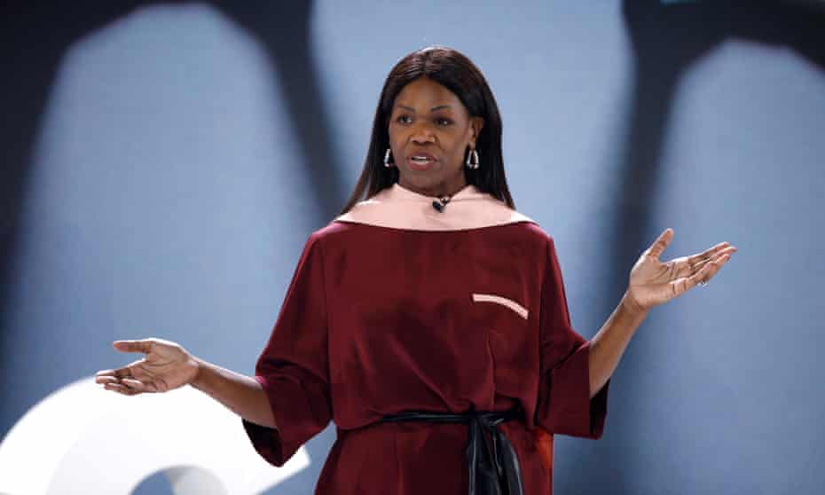 Dame Vivian Hunt speaks on stage during the summit in Oxfordshire, England.