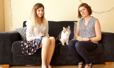 Kathryn Bromwich, Betty the cat, and cat trainer Sarah Ellis.