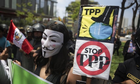 People protest against the Trans Pacific Partnership in Lima, Peru.