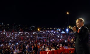 Recep Tayyip Erdoğan speaks to marchers at the Bosphorus bridge