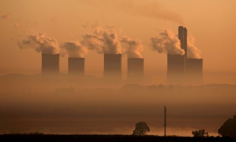 Steam rises from a coal-fired power station in South Africa. Sections of the report show coal use growing strongly, contributing to the second-largest increase in CO2 emissions in history.