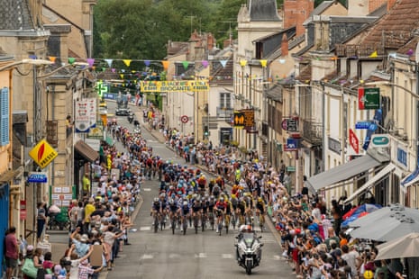 The peloton passes through the village of Cosne-d'Allier during yesterday’s stage 11.