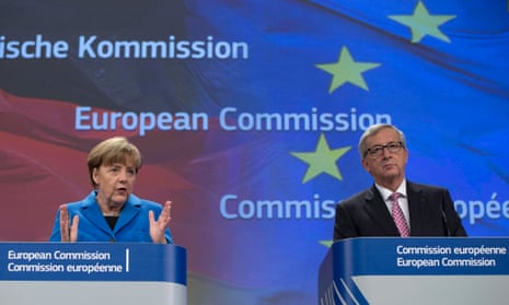 German Chancellor Angela Merkel (L) speaks at a joint news conference with European Commission President Jean-Claude Juncker at the EC headquarters in Brussels on 4 March 