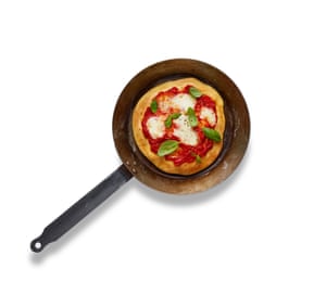 Felicity Cloake Frying-pan Pizza 07: 4Fry the dough on a hot skillet, adding tomato, mozzarella and other toppings when the top side begins to dry out.