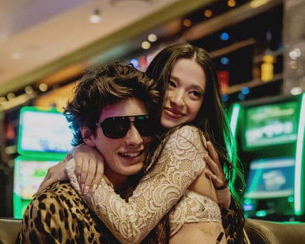 Mark Eidelshtein as Ivan and Mikey Madison as Ani in Anora.