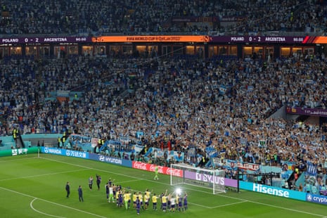 The Argentina players celebrate with their fans following their Group C victory over Poland.