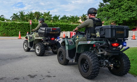 Law enforcement officers guard the surroundings of Donald Trump’s Mar-A-Lago in Florida following the apparent assassination attempt.
