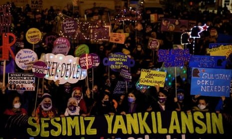 Turkish activists mark International Day for Violence Against Women in Istanbul. The banner at the front reads, “Let our voice be heard.”