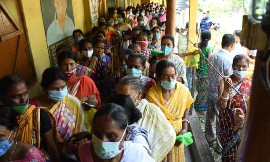 People waiting to receive a dose of Covid-19 vaccine.