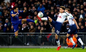 Dele Alli of Tottenham Hotspur challenges Pedro of Chelsea.