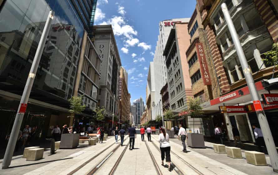 Pedestrians test out a finished section of George Street, Sydney where the NSW government is building a light railway network.
