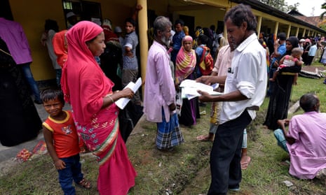 Villagers wait outside the National Register of Citizens centre to get their documents verified by government officials, at Mayong Village in Morigaon district, Assam.