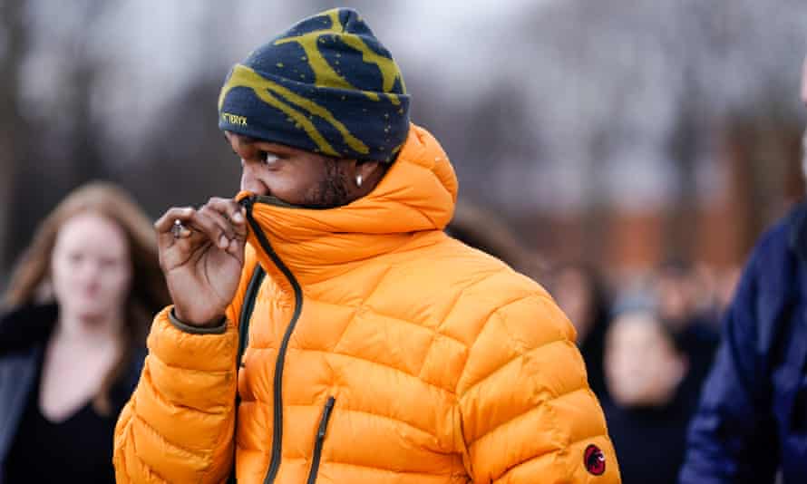 Frank Ocean in orange puffer jacket