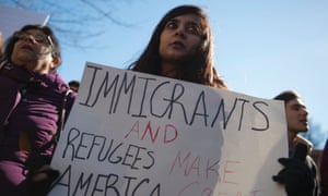 People protest outside the White House on 4 February.
