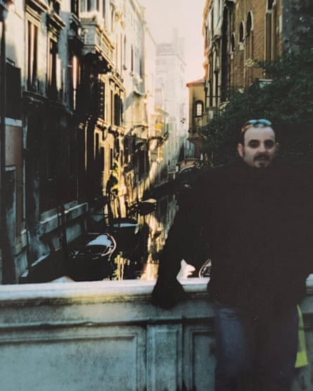 Soracchi posing on a bridge over a canal in Venice.