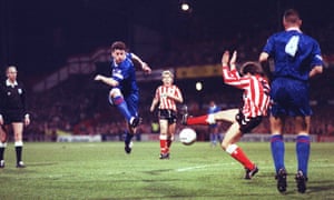 Chelsea’s Andy Townsend gets in a shot.