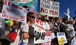 Environmental activists protest against Indian miner Adani’s proposed Carmichael coalmine outside Parliament House in Brisbane on Thursday.