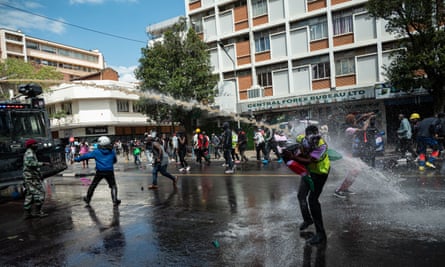 Water cannon is sprayed at protesters