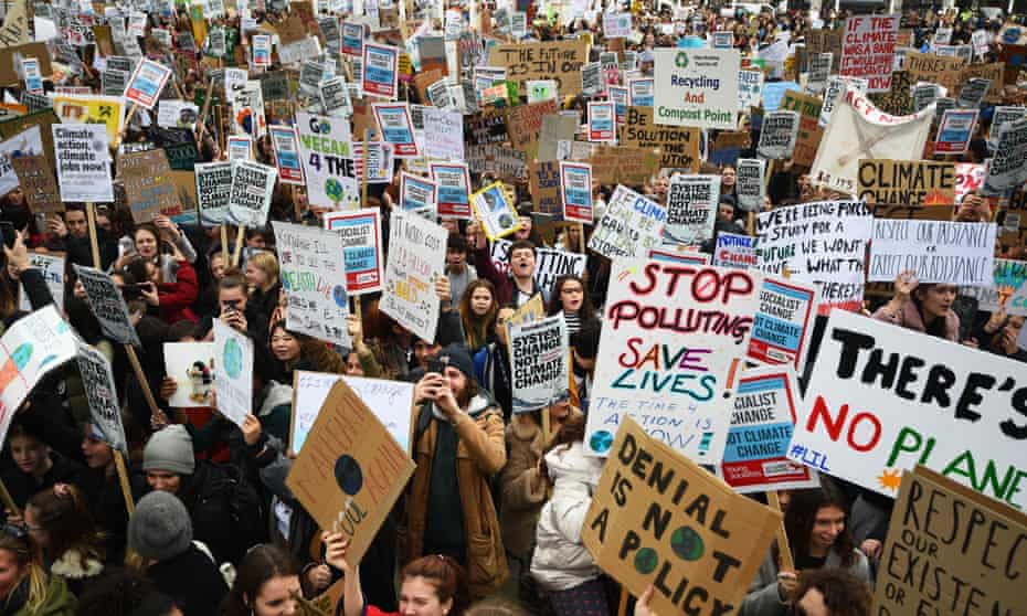 Students take part in a global school strike for climate change in London.