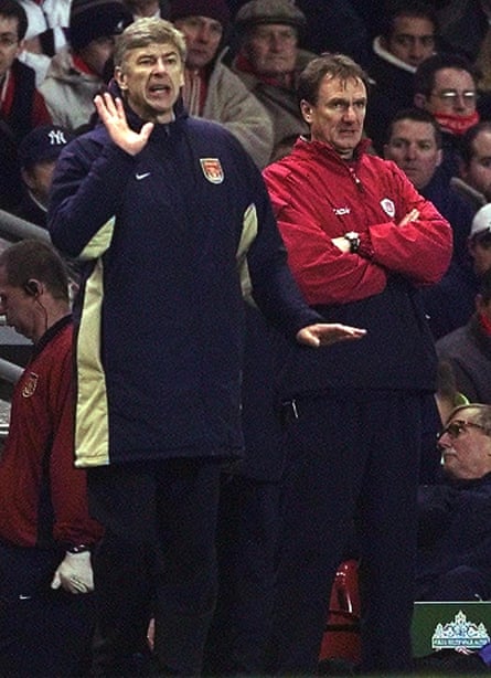 Arsène Wenger and Liverpool’s interim boss Phil Thompson both look on nervously.