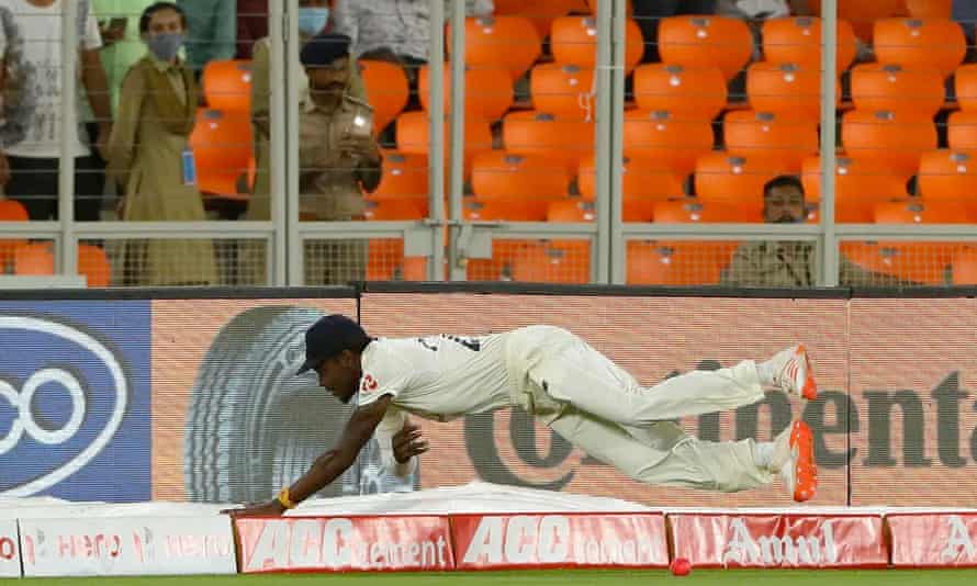 England’s Jofra Archer stops a boundary.