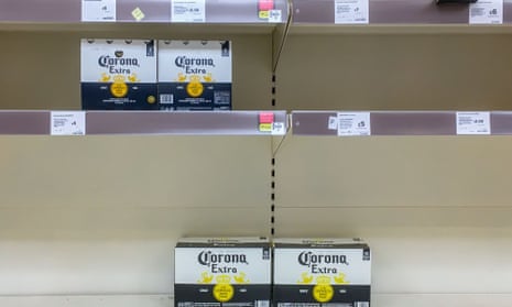 Empty shelves at a Sainsbury’s supermarket showing alcohol has seen increased demand.