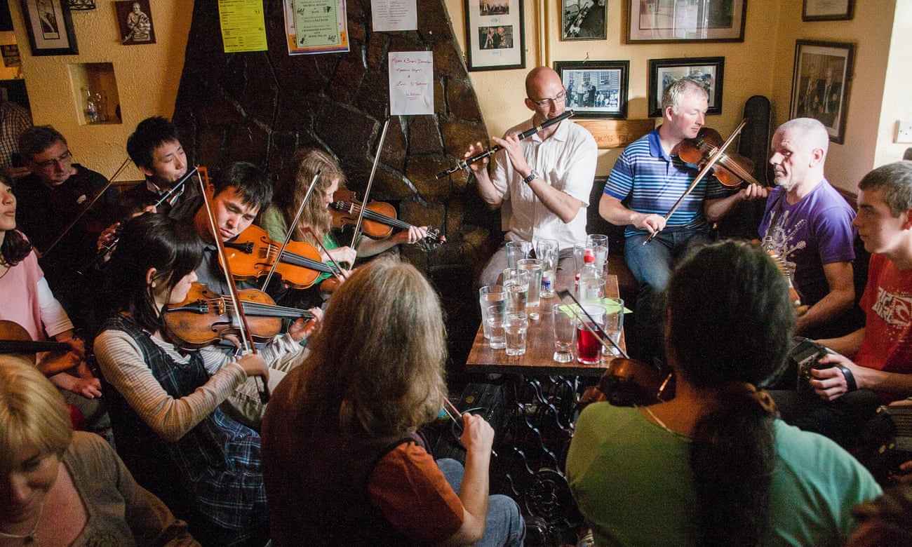 Fiddle and Irish music fans from around the world, including Japanese play in a small village pub