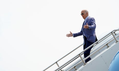 Joe Biden departs Air Force One as he arrives in Traverse City, Michigan, on Saturday.