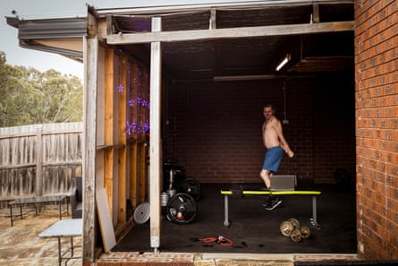 An exterior view of Jason Whiter's home gym – inside he is skipping in front of a laptop.
