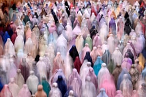 Muslim devotees offer night prayers marking the start of Islam’s holy fasting month of Ramadan at Istiqlal mosque in Jakarta, Indonesia
