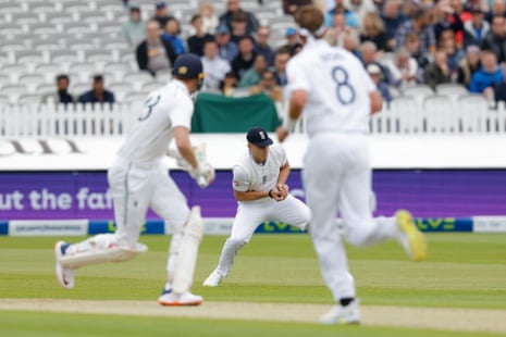 Ireland's Harry Tector is caught by England’s Matthew Potts.