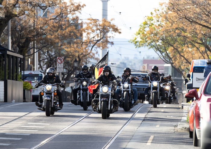 Motorcyclists lead the hearse up Gertrude Street in Fitzroy