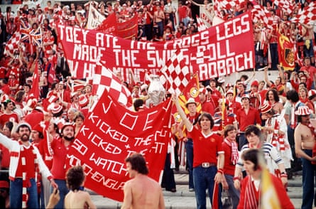 Liverpool fans cheer on their team during the 1977 European Cup final.