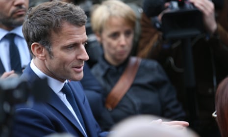 Emmanuel Macron meets voters during a visit to  Denain, northern France