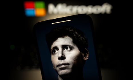 Altman on a phone screen in front of Microsoft logo