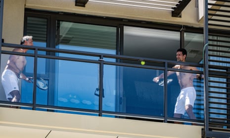 Novak Djokovic prepares for the Australian Open by playing tennis on his balcony in quarantine in Adelaide