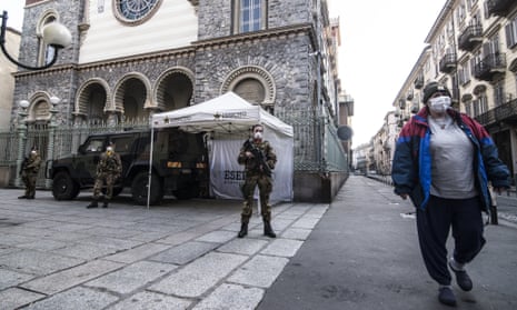 Soldiers guard the streets in Turin amid Italy’s nationwide lockdown