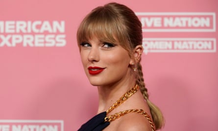 Taylor Swift arrives on the red carpet for the Billboard Women in Music awards, Los Angeles, 12 December 2019.