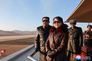 North Korea: Kim Jong Un (L) and his daughter inspect an air force demonstration
