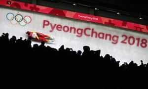 Felix Loch of Germany slides during the men’s singles luge on day one of the Winter Olympics.