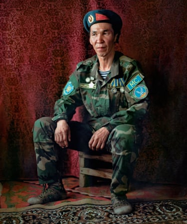Military veteran from the 1993 military intervention in Tajikistanagainst Mujahadeen insurgents poses wearing his military uniform