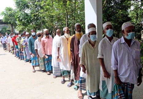 People queue to get their second doses during a mass vaccination campaign against Covid-19 in Chandpur, Bangladesh.